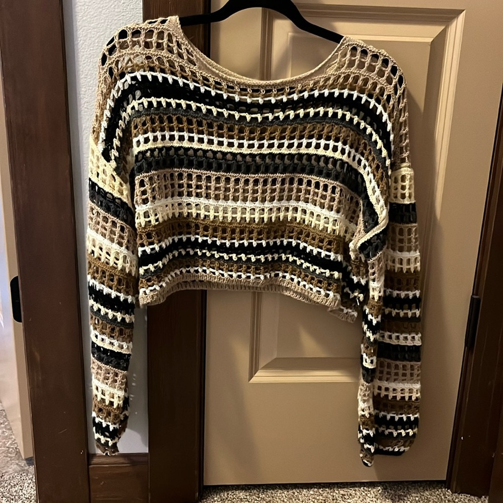 crochet cropped sweater. It’s super soft and light weight